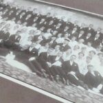 Vana raamitud grupifoto leerilastest ja vaimulikest